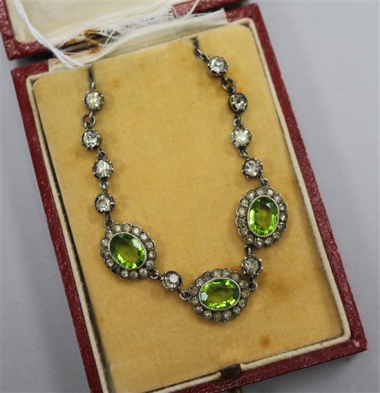 An early 20th century white metal and two colour paste set necklace, 38cm.